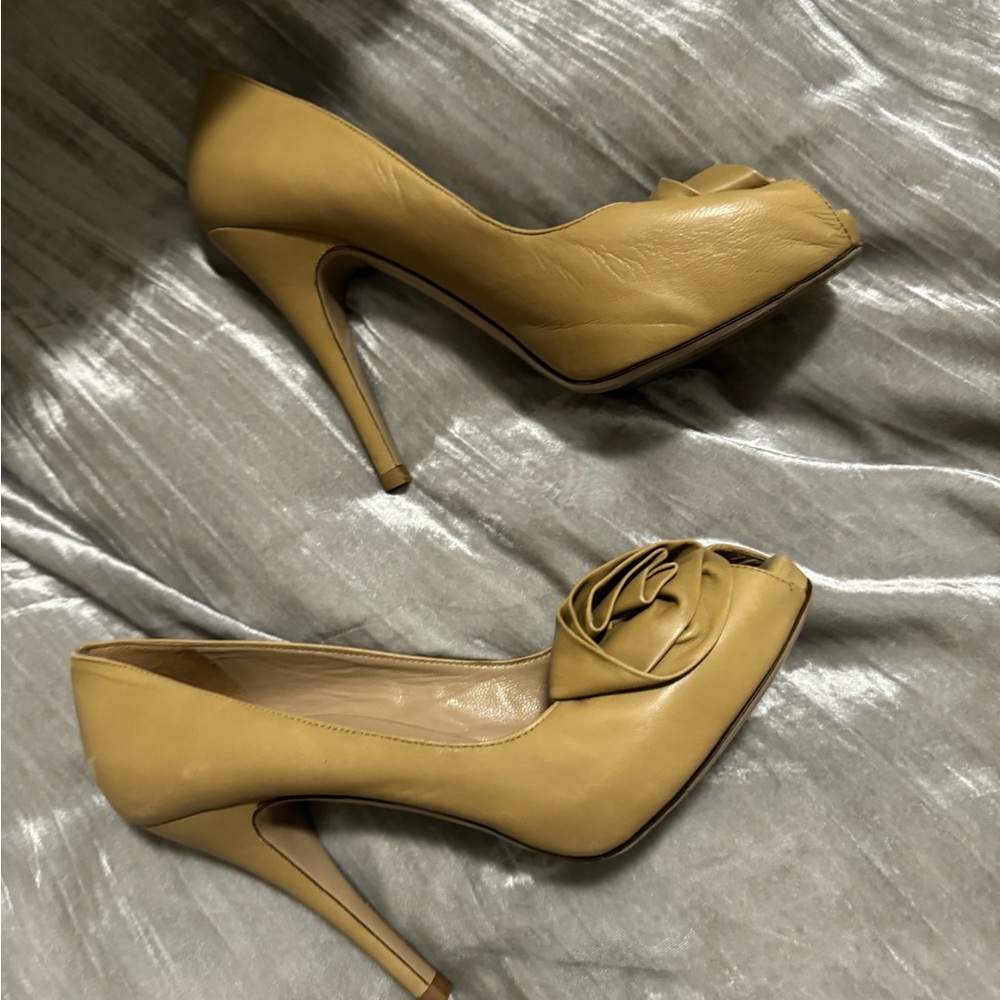 Nude Valentino heels with rose